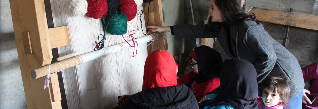 A student-led community service project aiming to revive the fading traditional handicraft of Feccan carpet weaving in Al-Fakiha village